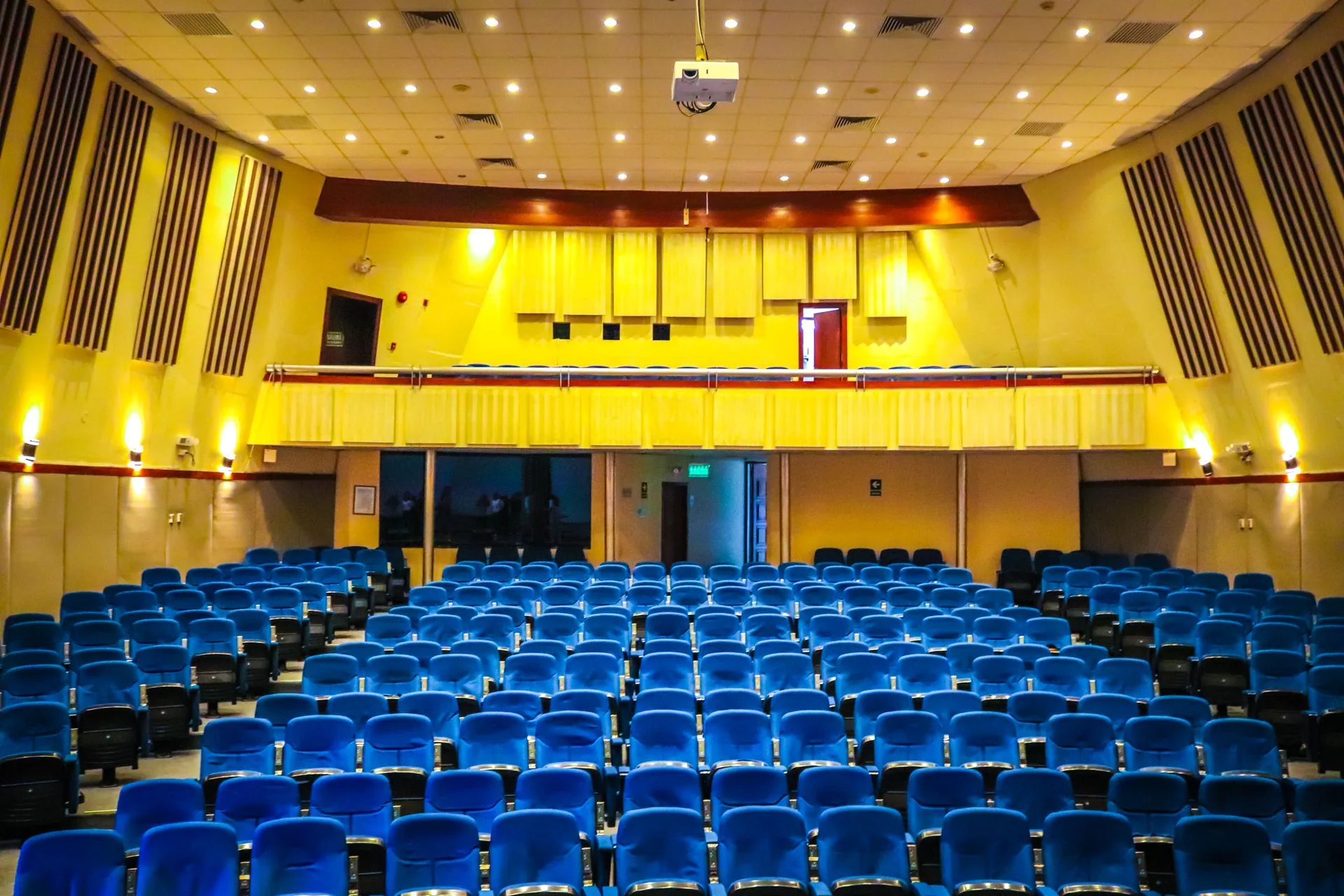 Rows of empty seats in a live room